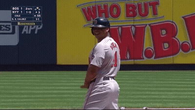 A Baseball Player Is Smiling In Front Of A Wall That Says Who But W.b. GIF