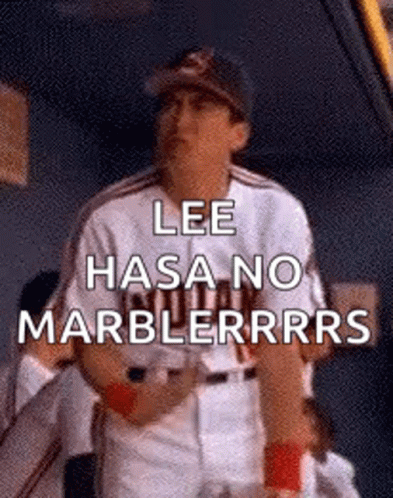 A Baseball Player Is Standing In The Dugout And Says `` Lee Hasa No Marblerrrs '' . GIF