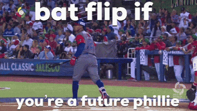 A Baseball Player Is Swinging A Bat And Says Bat Flip If You 'Re A Future Phillies Player GIF