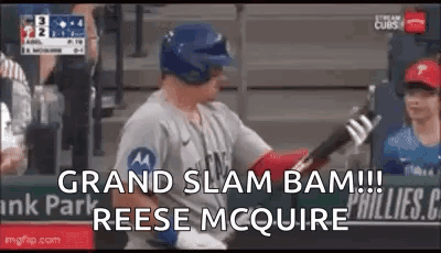 A Baseball Player Is Swinging A Bat At A Ball And Says `` Grand Slam Bam !!! '' . GIF