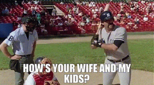 A Baseball Player Is Swinging A Bat At A Pitch While A Catcher Looks On . GIF