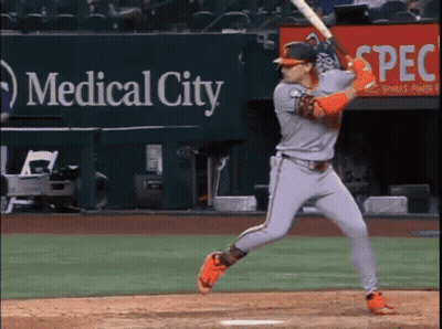 A Baseball Player Is Swinging At A Pitch In Front Of A Medical City Sign GIF