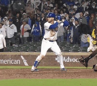 A Baseball Player Is Swinging His Bat In Front Of An American Airlines Advertisement GIF