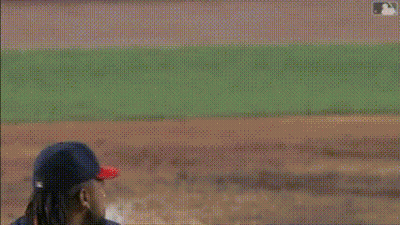 A Baseball Player Is Trying To Catch The Ball While A Catcher Is Kneeling Down GIF