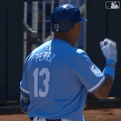 A Baseball Player Is Wearing A Blue Jersey With The Number 13 On It GIF