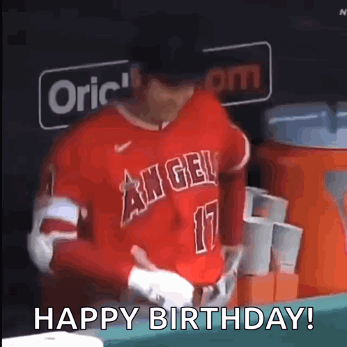 A Baseball Player Is Wearing A Red Jersey With The Number 17 On It And Says `` Happy Birthday '' . GIF