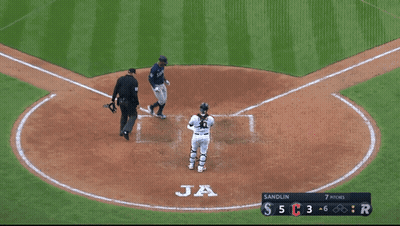 A Baseball Player Named Julio Rodriguez Is Standing On The Base GIF