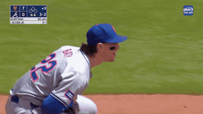 A Baseball Player Named Quintana Is On The Field During A Game GIF