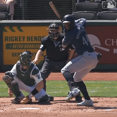 A Baseball Player Named Rickey Henderson Swings At A Pitch GIF