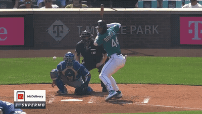 A Baseball Player Named Rodriguez Is Swinging At A Ball GIF