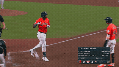 A Baseball Player Named Yordan Alvarez Is Running Towards The Base GIF