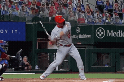 A Baseball Player Swings At A Pitch In Front Of A Sign That Says Medical City Healthcare GIF