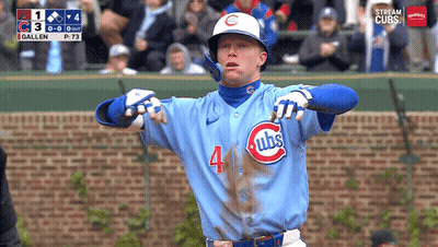 A Baseball Player Wearing A Blue Cubs Uniform GIF