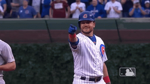 A Baseball Player Wearing A Blue Helmet With A C On It GIF
