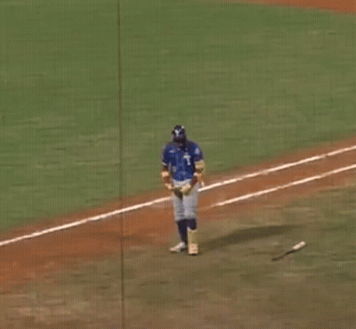 A Baseball Player Wearing A Blue Jersey With The Number 21 On It GIF
