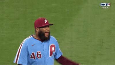 A Baseball Player Wearing A Blue Jersey With The Number 46 GIF