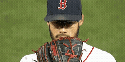 A Baseball Player Wearing A Boston Red Sox Hat And Sunglasses GIF