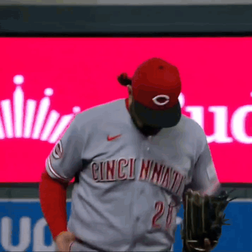 A Baseball Player Wearing A Cincinnati Jersey With The Number 26 On It GIF