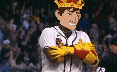 A Baseball Player Wearing A Crown And Gloves With The Number 43 On The Back Of His Jersey GIF