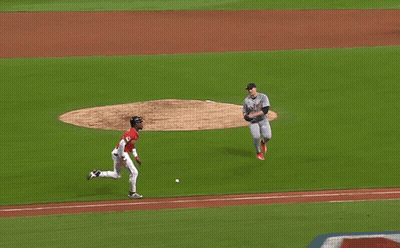 A Baseball Player Wearing A Detroit Jersey Is Sliding Into Second Base GIF