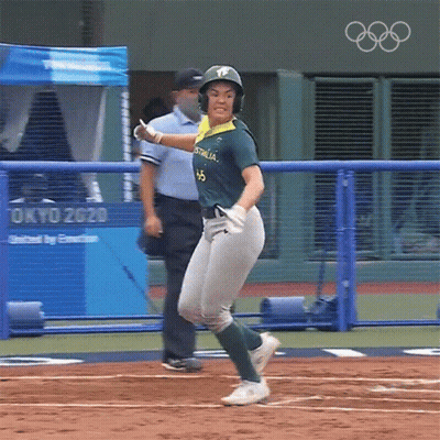 A Baseball Player Wearing A Green And Yellow Jersey With Australia On It GIF