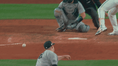 A Baseball Player Wearing A Green Jersey That Says Reds On It GIF