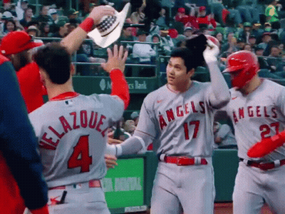 A Baseball Player Wearing A Grey Jersey With The Number 4 On It GIF
