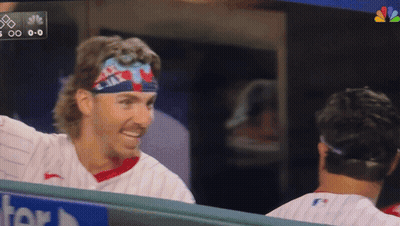 A Baseball Player Wearing A Headband That Says Ejax GIF