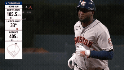 A Baseball Player Wearing A Houston Jersey Is Running Towards Home Plate GIF