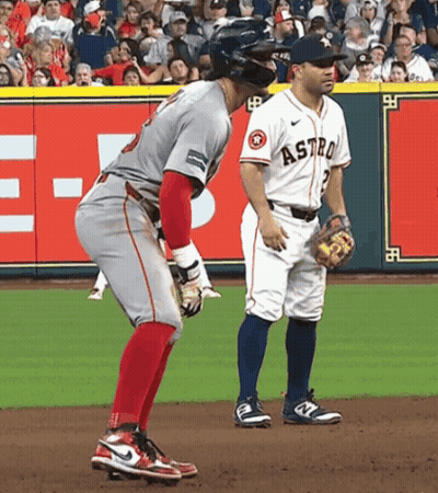 A Baseball Player Wearing A Jersey That Says Astro GIF