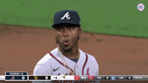 A Baseball Player Wearing A Jersey That Says Atlanta GIF