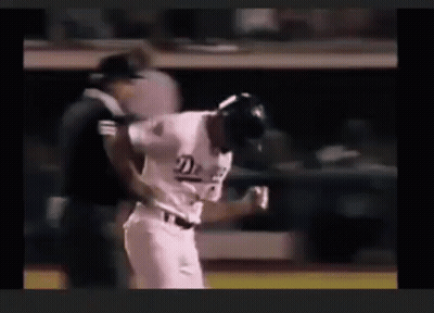 A Baseball Player Wearing A Jersey That Says ' Detroit ' On It GIF