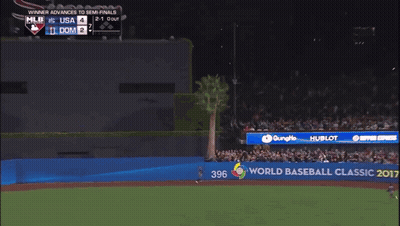 A Baseball Player Wearing A Jersey That Says ' Dominican ' On It GIF