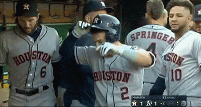 A Baseball Player Wearing A Jersey That Says Houston 2 GIF