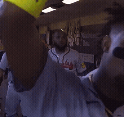 a baseball player wearing a jersey that says kansas city