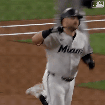 A Baseball Player Wearing A Jersey That Says Miami GIF