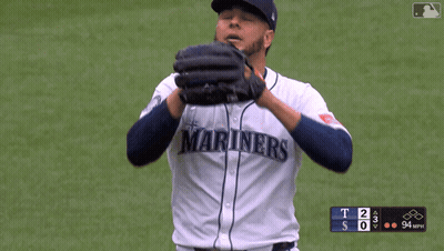 A Baseball Player Wearing A Jersey That Says Seahawks On It GIF