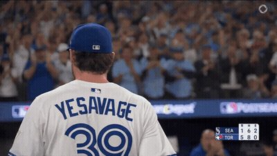 A Baseball Player Wearing A Jersey That Says Yesavage On The Back GIF