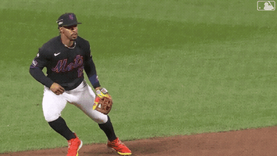 A Baseball Player Wearing A Jersey With The Number 2 On It Is Trying To Catch A Ball GIF