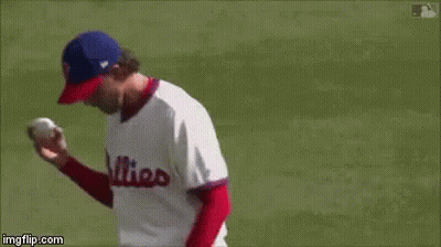 A Baseball Player Wearing A Jersey With The Number 22 On It GIF