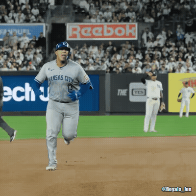 A Baseball Player Wearing A Kansas City Jersey Runs On The Field GIF