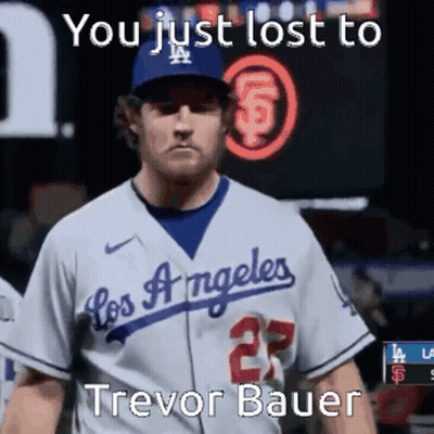 A Baseball Player Wearing A Los Angeles Jersey And Hat GIF