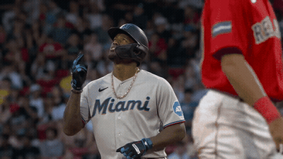 A Baseball Player Wearing A Miami Jersey Looks Up GIF