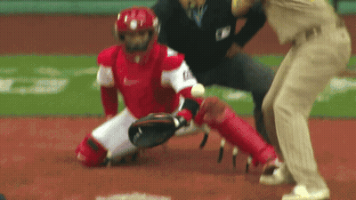 A Baseball Player Wearing A Nike Uniform Is Kneeling Down On The Field GIF