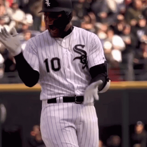 A Baseball Player Wearing A Number 10 Jersey GIF