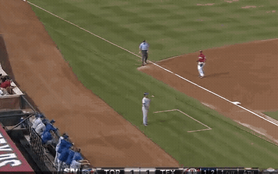 A Baseball Player Wearing A Number 2 Jersey Stands On The Field GIF