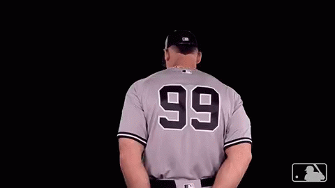 A Baseball Player Wearing A Number 99 Jersey GIF