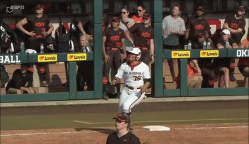 A Baseball Player Wearing A Oklahoma Jersey Runs To The Base GIF