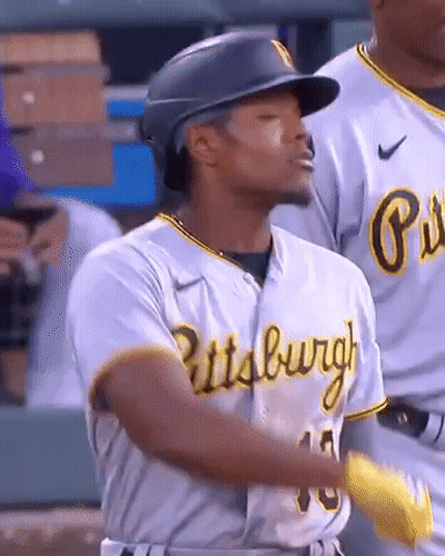 A Baseball Player Wearing A Pittsburgh Jersey With The Number 15 On It GIF
