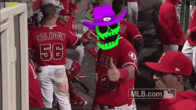 A Baseball Player Wearing A Purple Cowboy Hat With A Skull On It GIF
